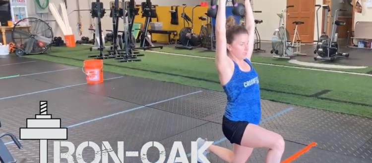 Double Kettlebell Lunge w/OH Hold